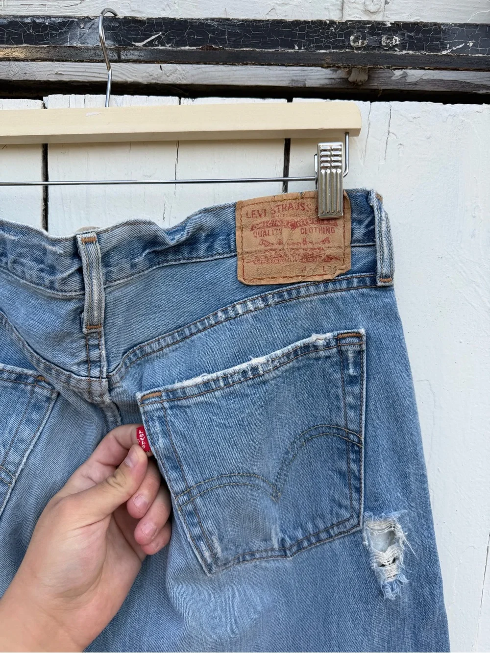 Levi's Medium Blue Bootcut Jeans with Distressed Hem
